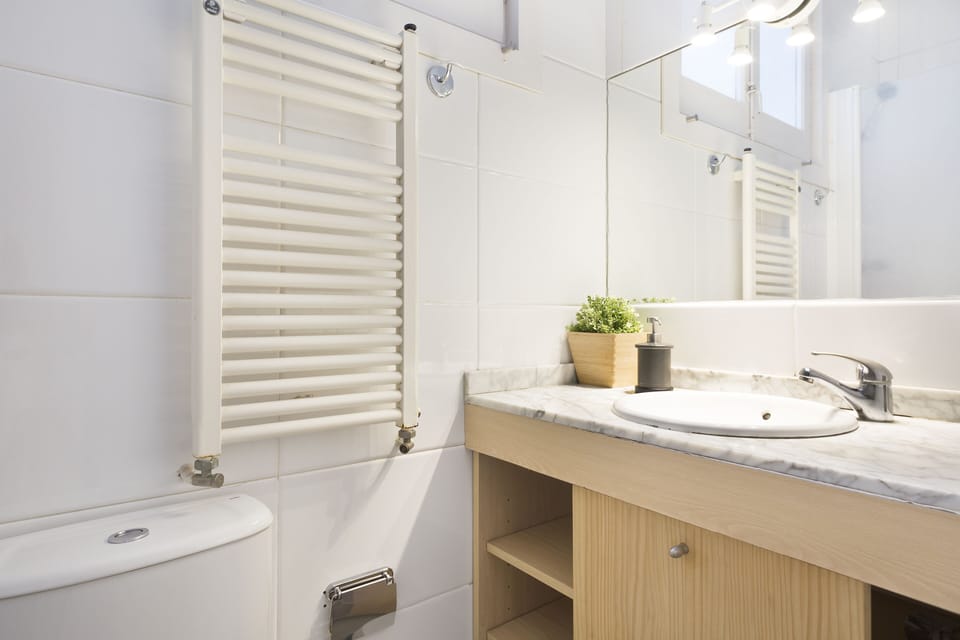 Bathroom with shower, sink, toilet
