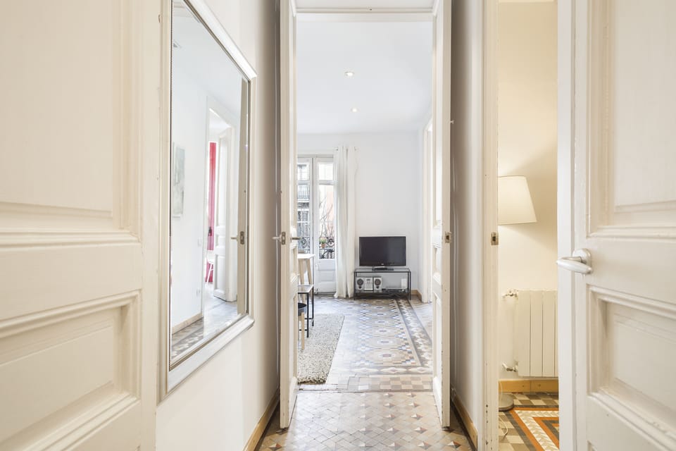 Hallway and partial view of Living room