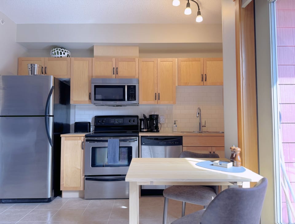 A fully equipped kitchen for your use with full-sized appliances