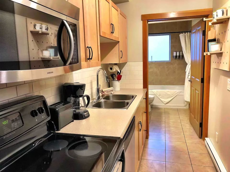 A fully-equipped kitchen for your use with  full-sized appliances