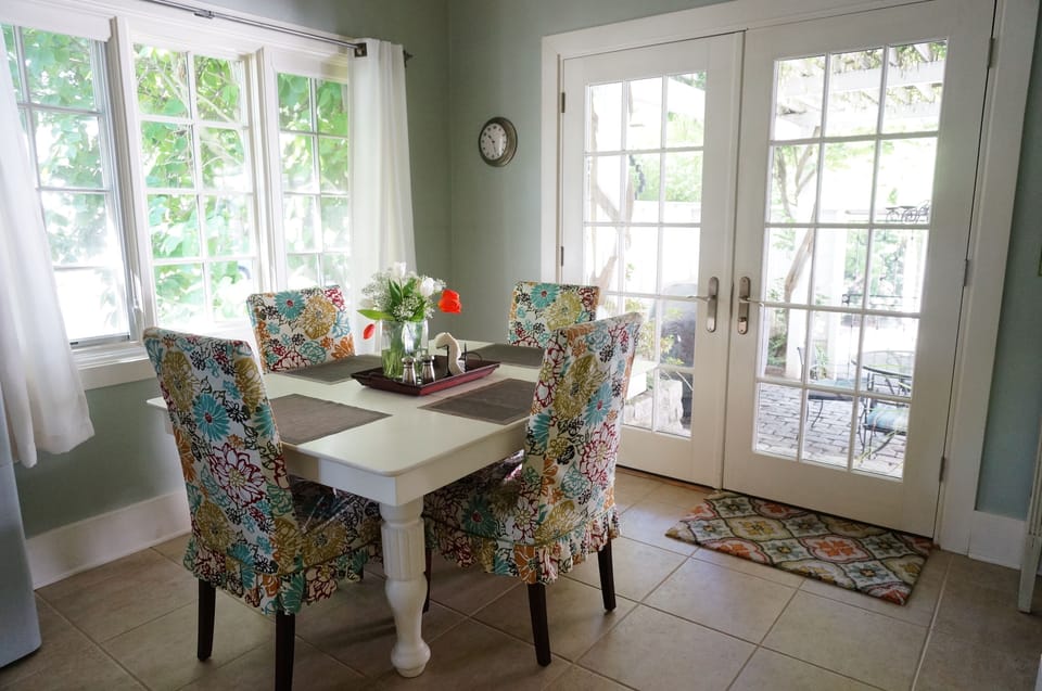 Kitchen breakfast table, seating for 4-6. Highchair and booster seat available