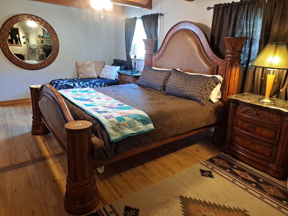 The king bed in the master bedroom.