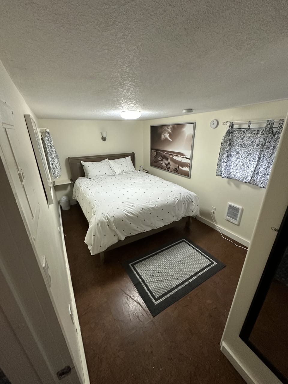 Master bedroom with TV. Ceilings are lower in here if you’re tall