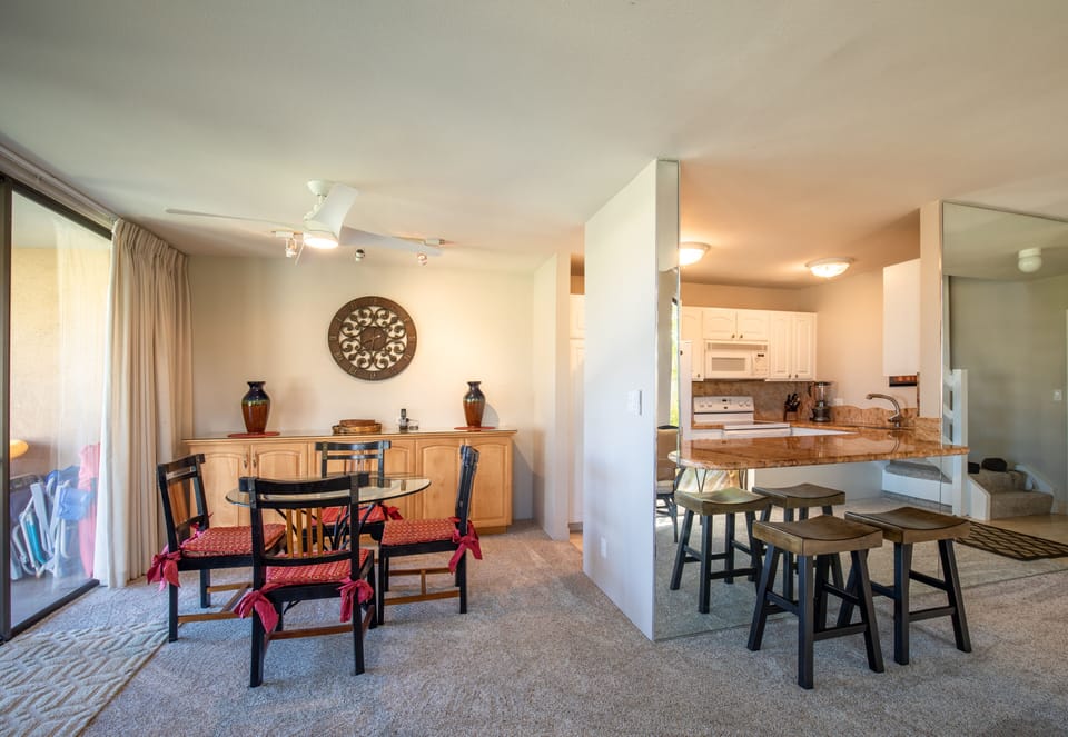 View of the dining area and kitchen.