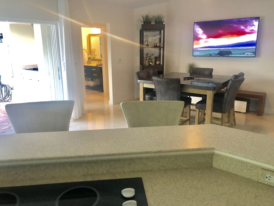 Open kitchen overlooking view and dining area. Great for hanging out!
