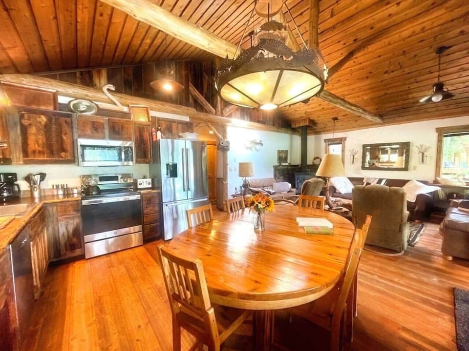 Full kitchen with all the essentials including tableware for 30.  Two refrigerator freezers, a mini-fridge, microwave, oven and stove, crockpot, panini maker, waffle maker, and griddle. 
