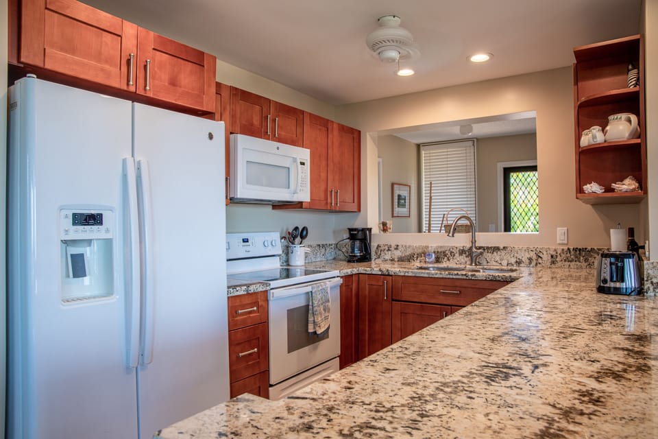 Open plan kitchen with all new appliances.