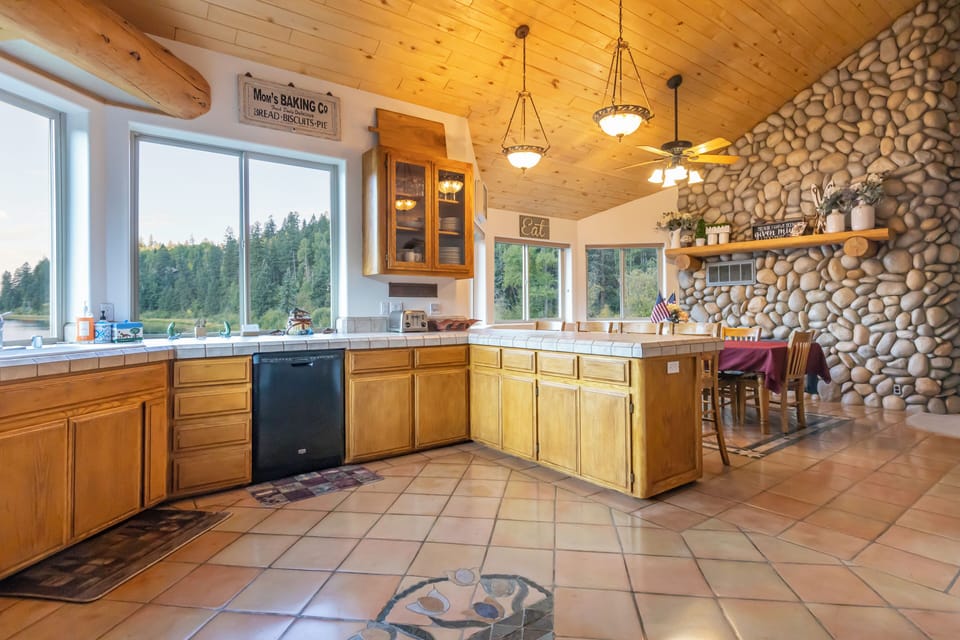 Large open kitchen well stocked for your cooking needs.
