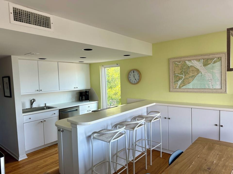 Fully equipped kitchen includes a coffee maker with a Keurig.
