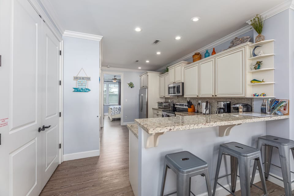 Fully stocked kitchen with almost anything you can think of for cooking.