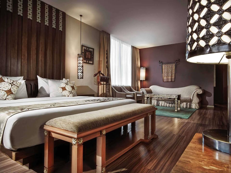 Junior Suite, 1 King Bed | Premium bedding, down comforters, minibar, in-room safe