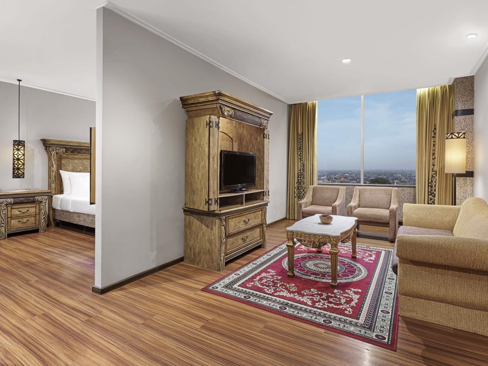 Executive Suite, 1 King Bed | Premium bedding, down comforters, minibar, in-room safe