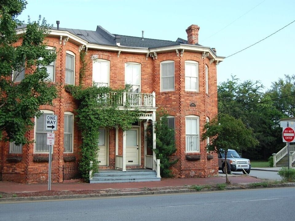 Front of Townhome among 'Victoria Row' circa 1893 (Fragrant Confederate Jasmine)