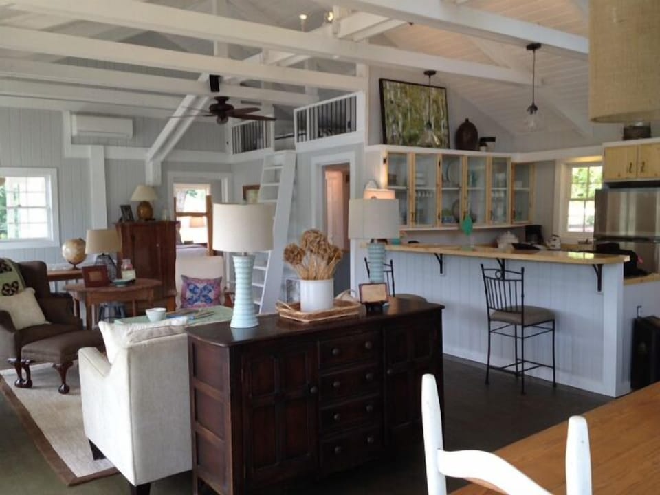 Main level Great Room has cozy sleeping loft creating a Fourth Sleeping space,