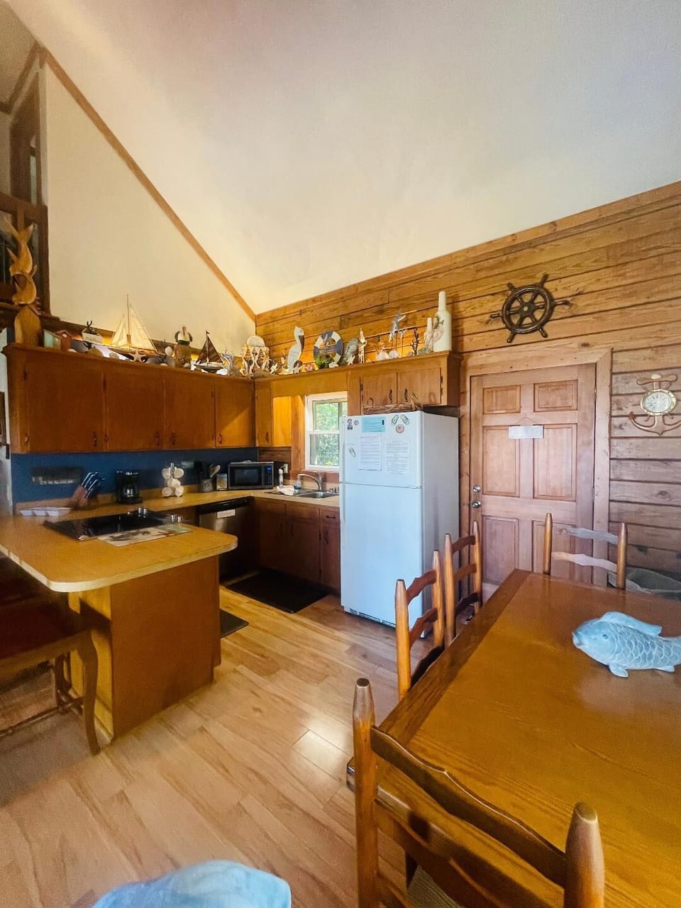 Kitchen with magnificent and unique overhead beach decor