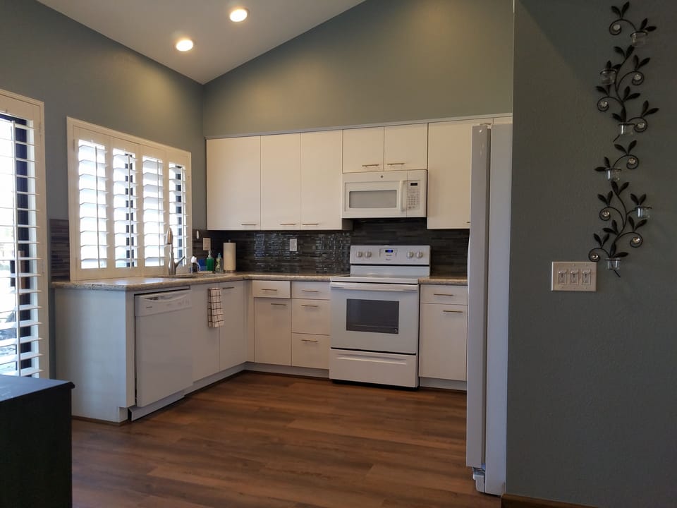 Fully equipped kitchen has brand new appliances. Dishwasher, micro, stove fridge