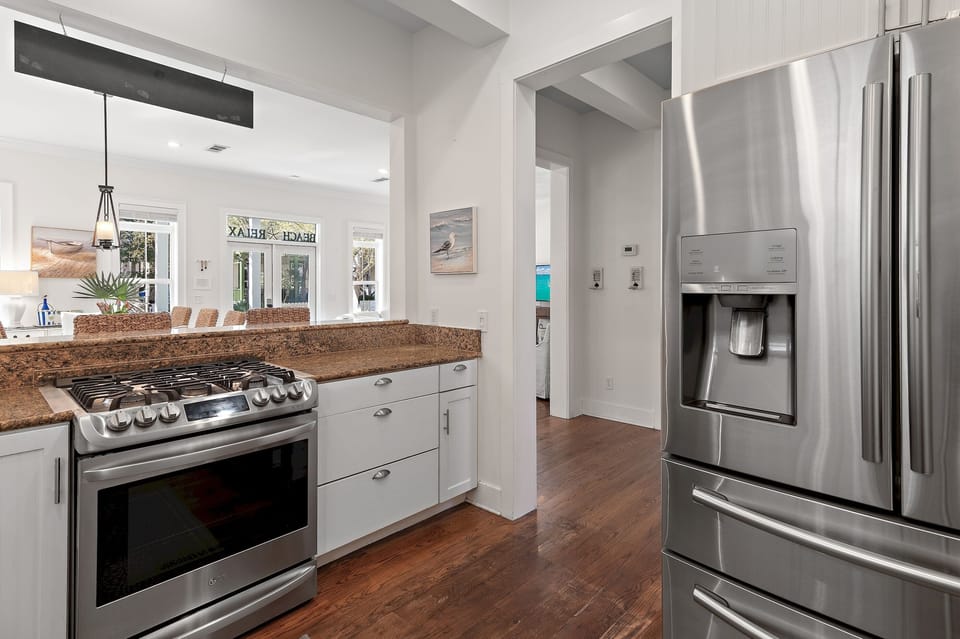 Kitchen with French-door refrigerator with ice maker