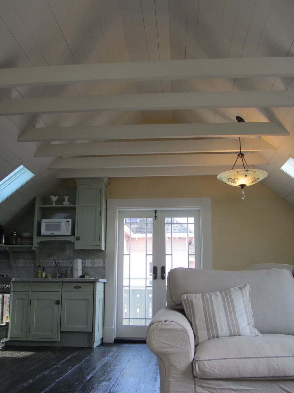 From bedroom looking out to living area and balcony