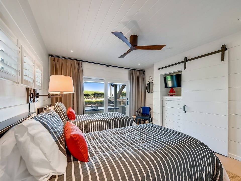Guest Bedroom with Covered Porch and Ocean Access at 8 East Beach Lagoon