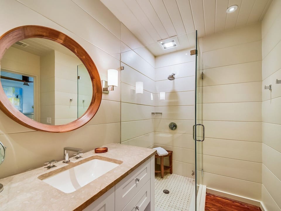 Renovated Guest Bathroom with Walk in Shower at 8 East Beach Lagoon