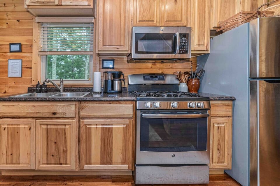 Kitchen is full stocked with dining and cookware essentials. Drip coffee maker and coffee provided along with kettle and a selection of teas.