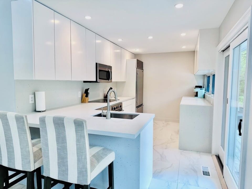 Renovated kitchen with wine fridge, top of the line appliances