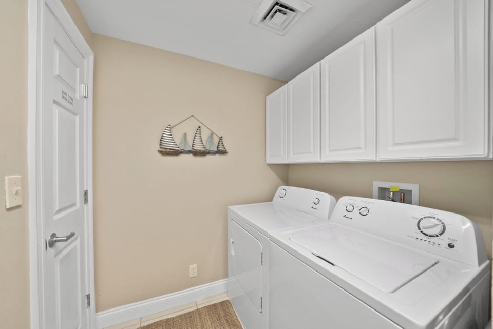 Your private laundry room makes packing light easy—full-size washer and dryer with ample storage above.