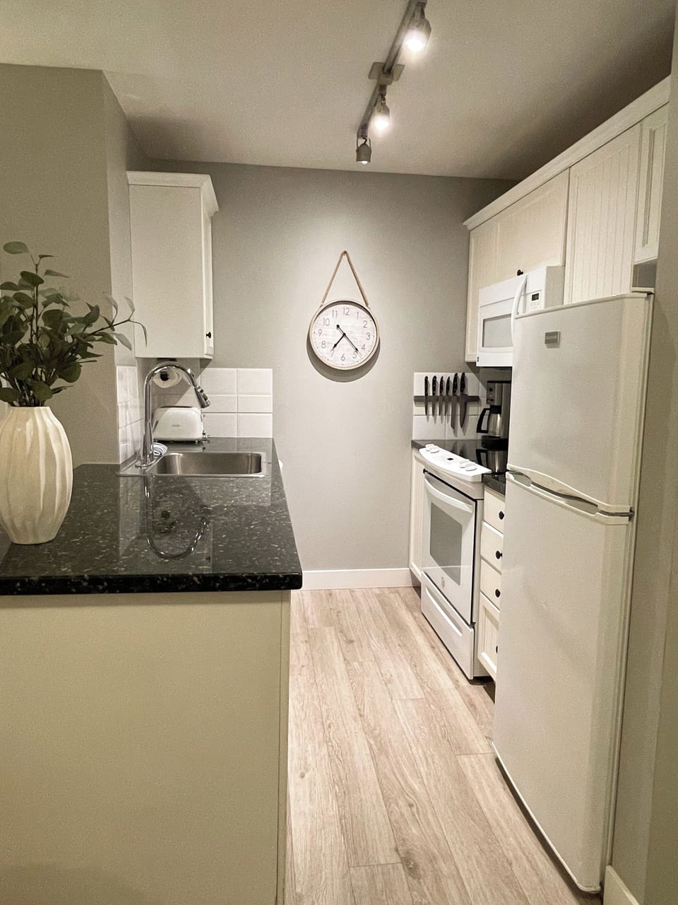 Well stocked kitchen with full size appliances (d/w, fridge/freezer, stove, mic)