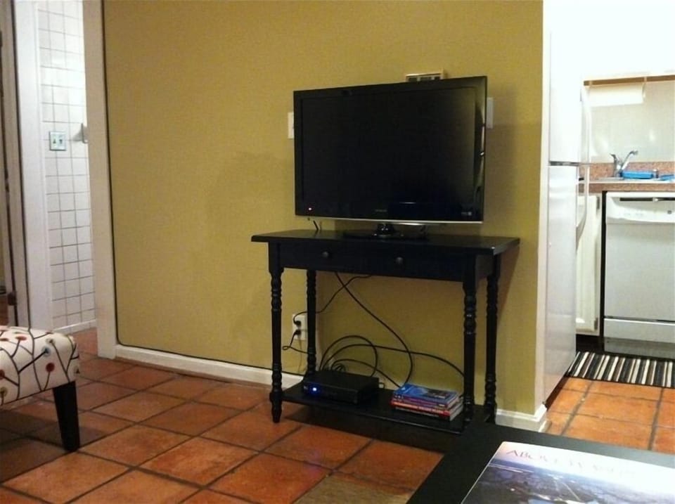 32' flat screen TV with HBO and Showtime in the living room.