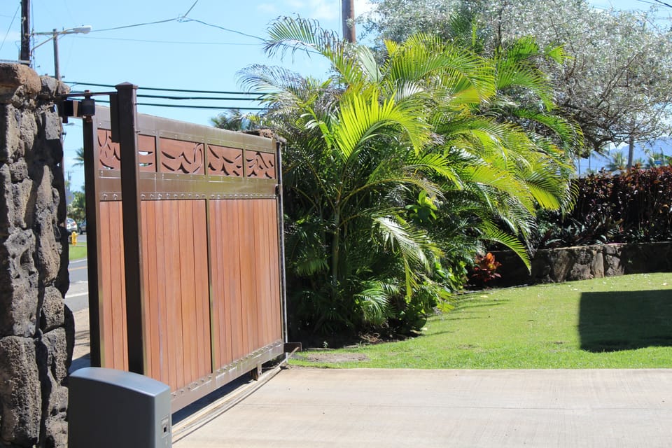 Electric gate for privacy, security, and parking.