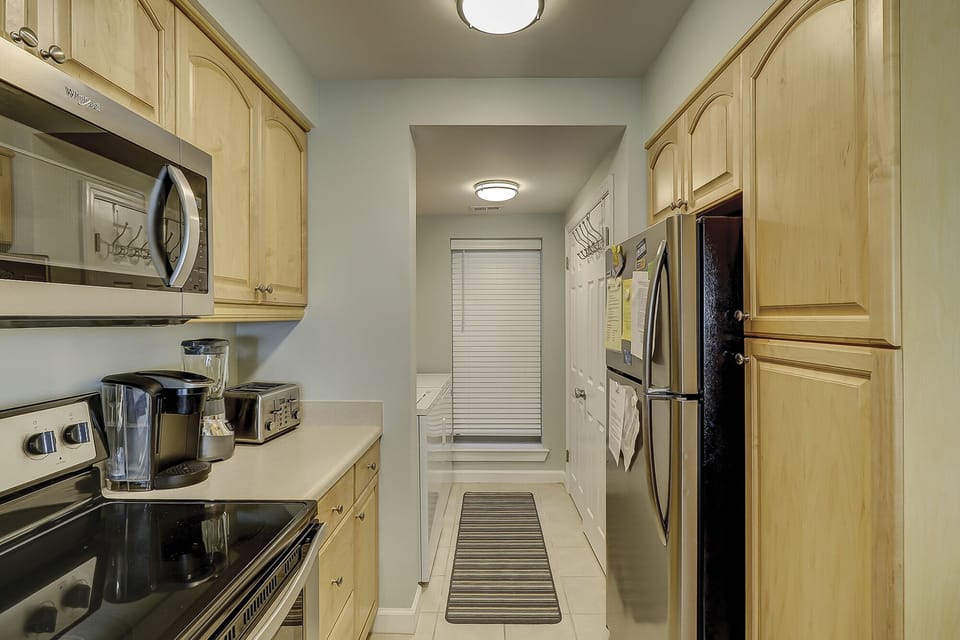 Kitchen & Laundry area in the background