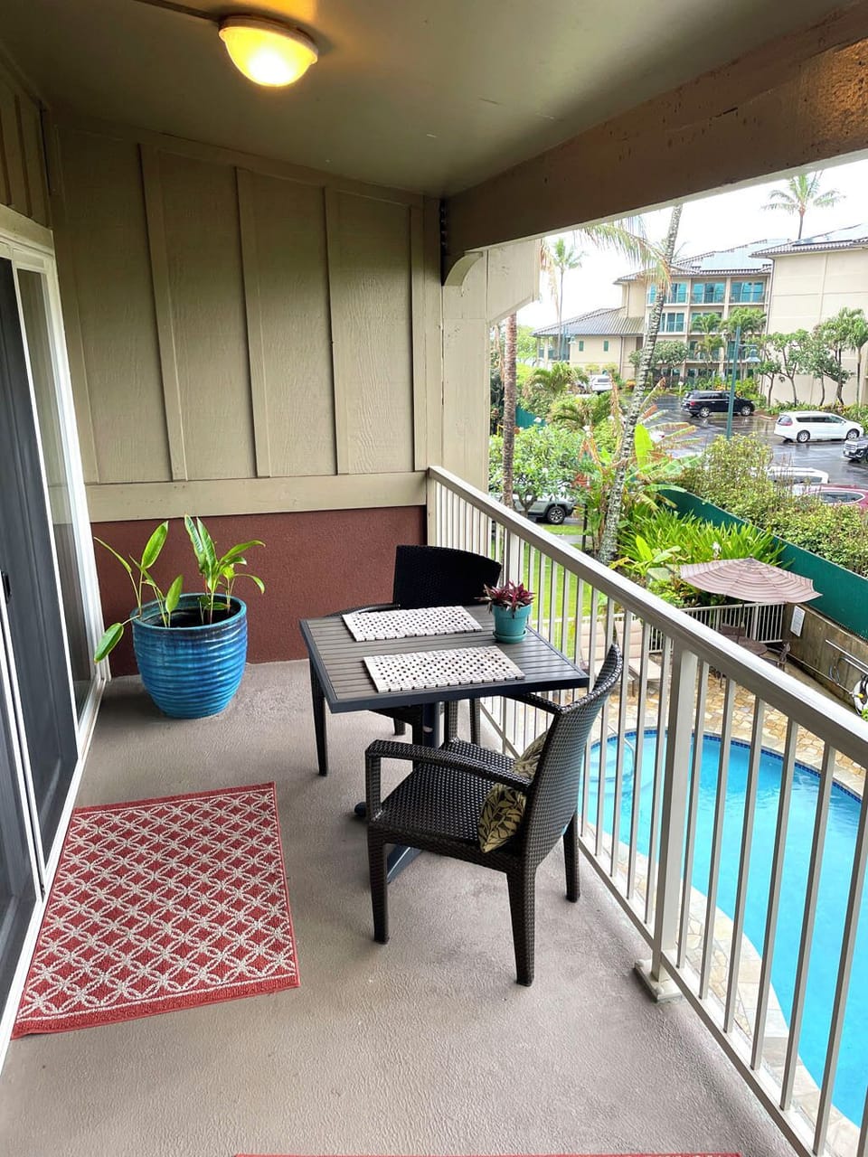 Lanai dining and view of garden pool