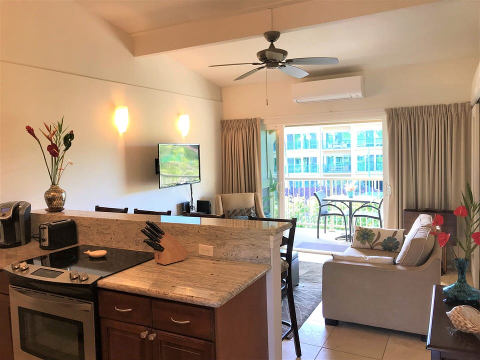 Living room with 55” cable TV & Google channels - A/C above slider