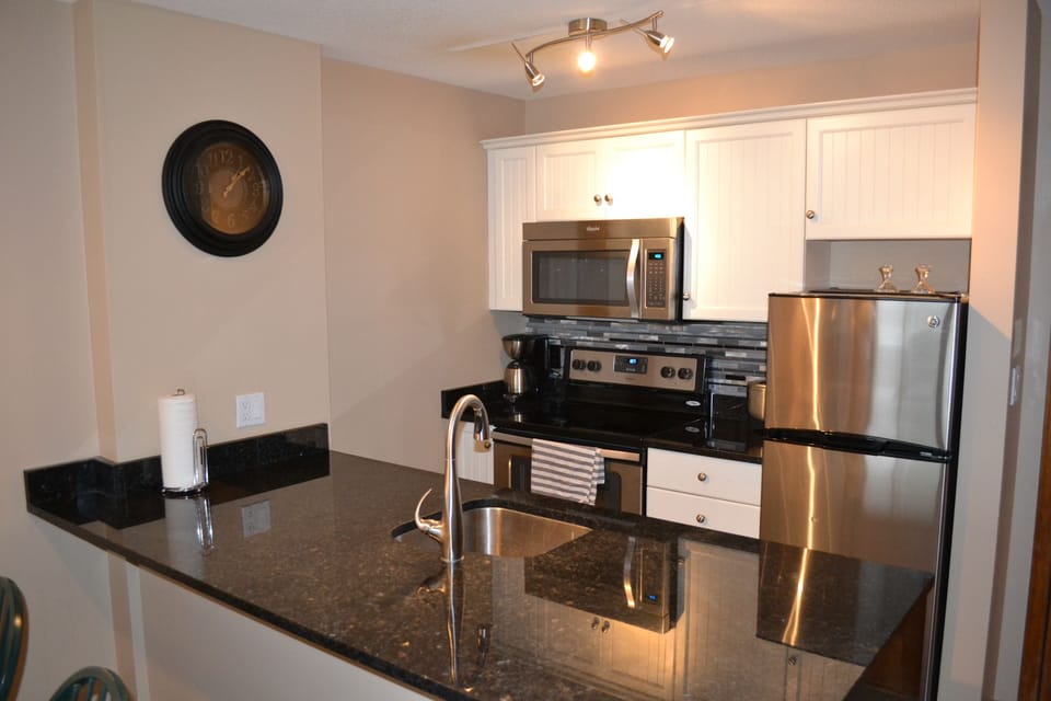 Refurbished kitchen with granite and new appliances