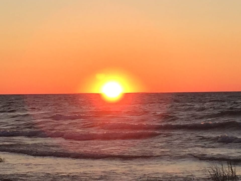 Summer Sunset Photo From the Property Shore