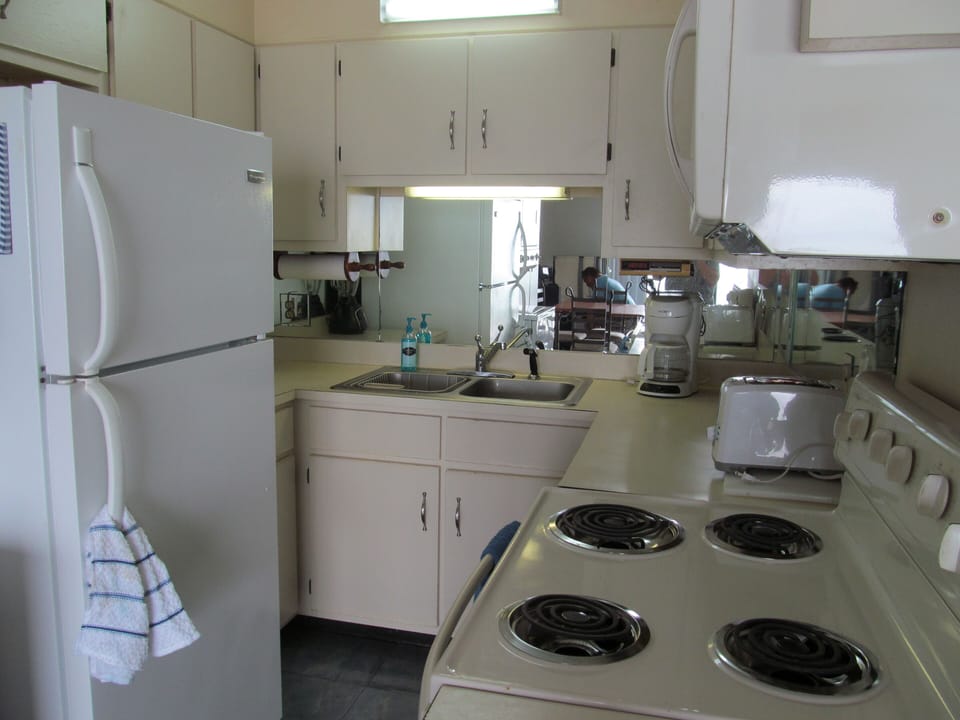Fully Equipped Kitchen For Your Convenience.