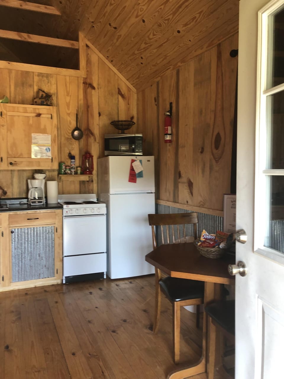 Kitchen - stocked with pots, pans, dishes, etc.