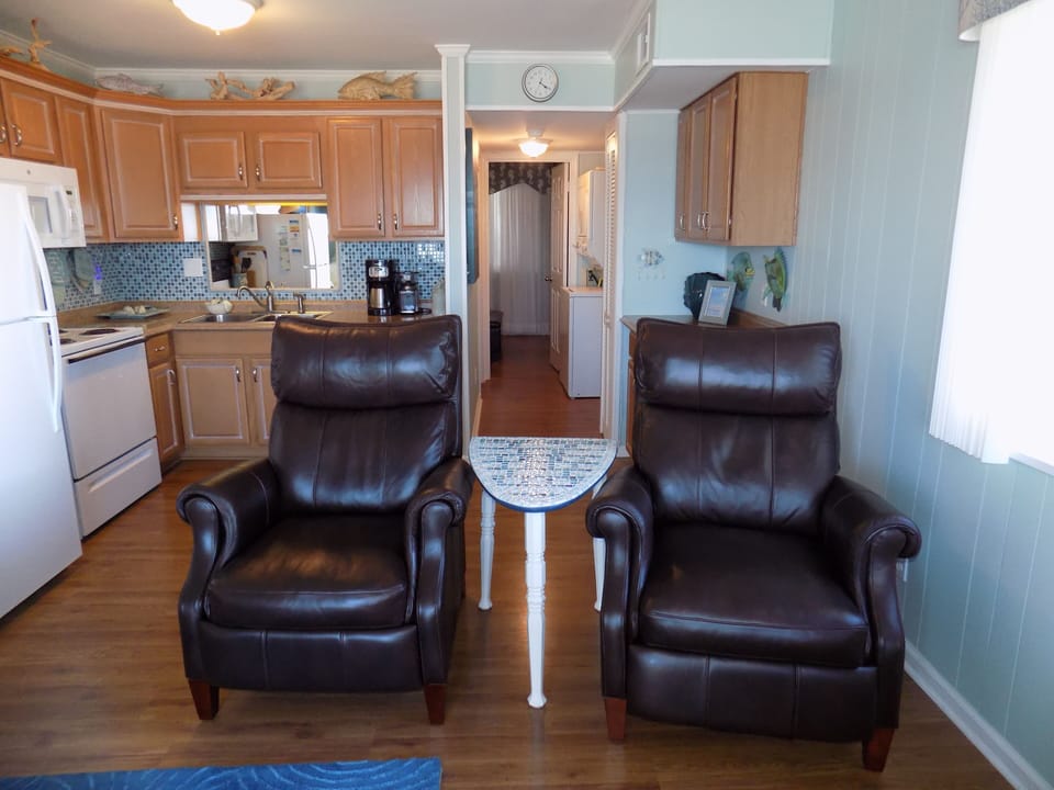 His 'n Her Leather Recliners. No cheap hotel furniture Relax, Gaze at the Ocean