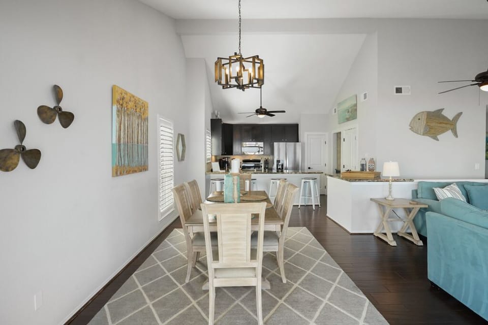 The table seats 6, but can accommodate 8 using additional chairs from downstairs