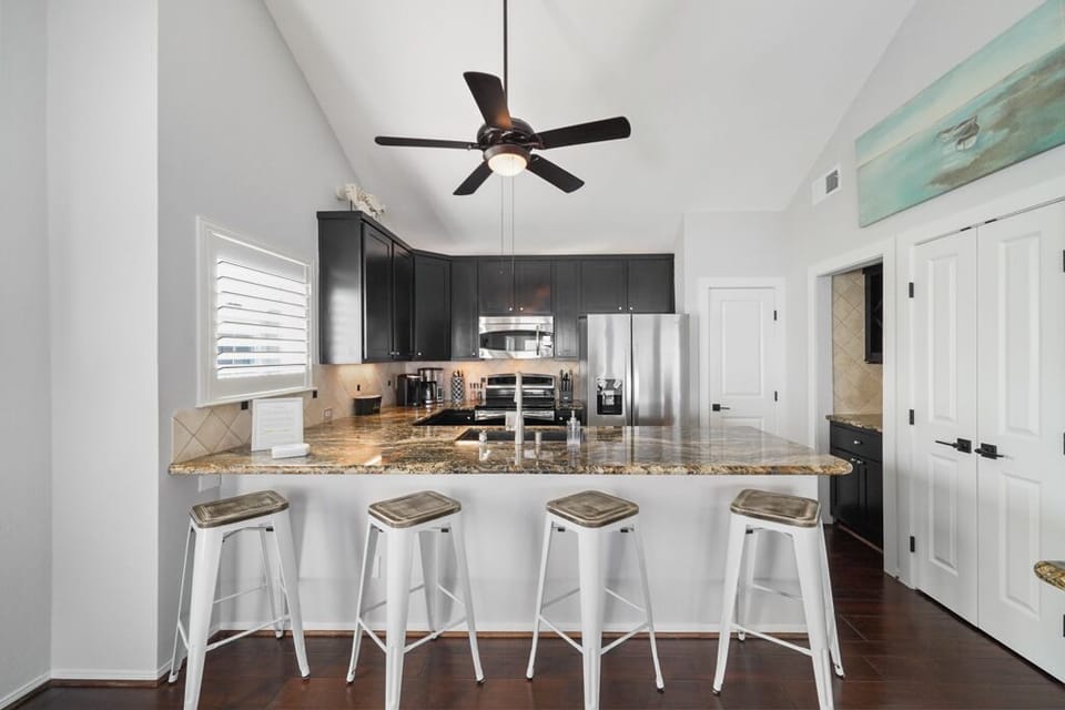 Updated kitchen with newer appliances also seats 4 at the large island