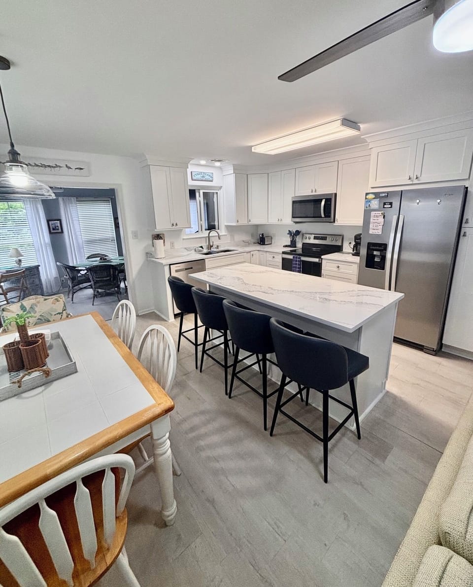 Kitchen. View into Sunroom.