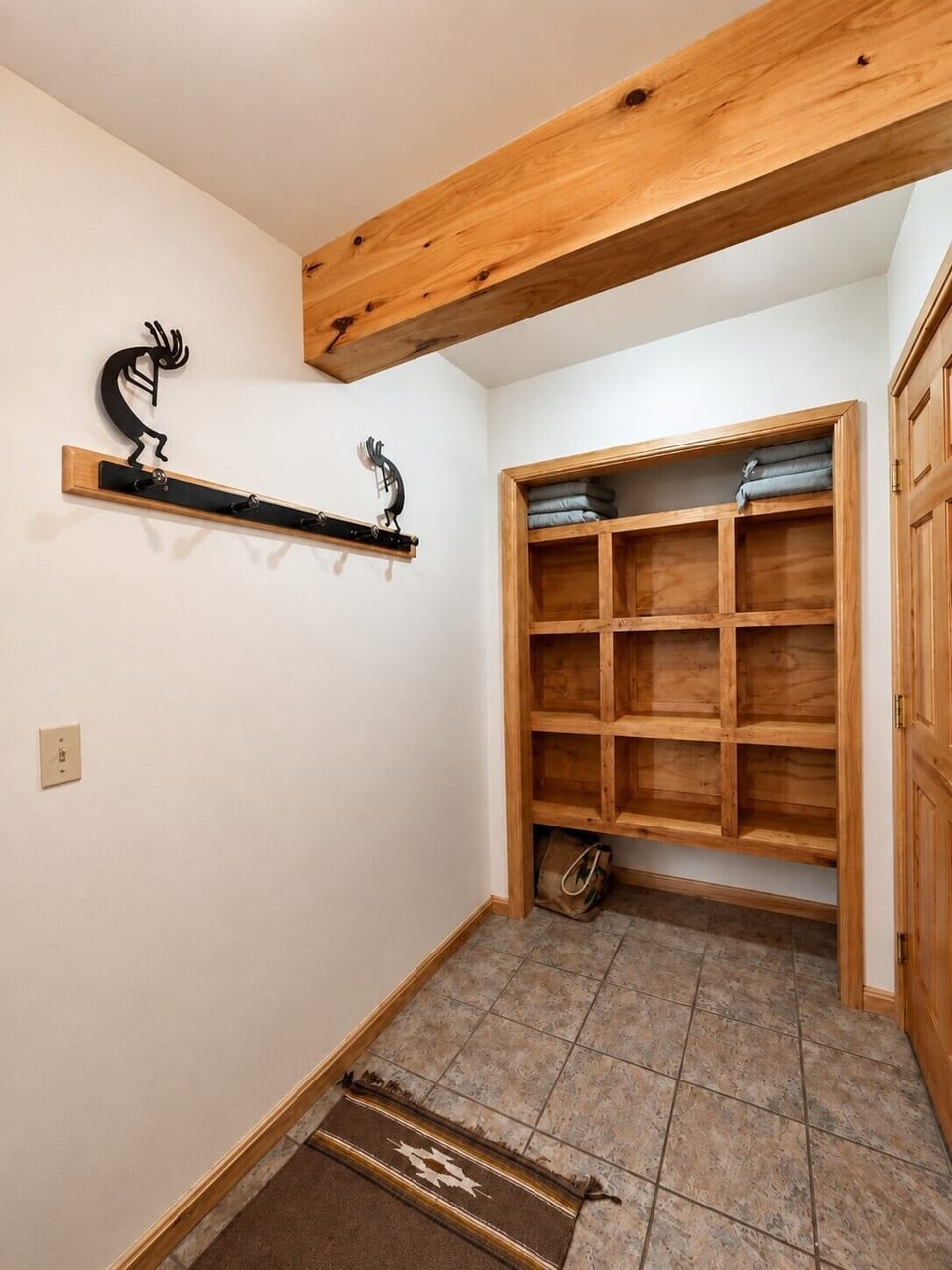 Mudroom off the garage with cubbies and hooks for all your mountain gear