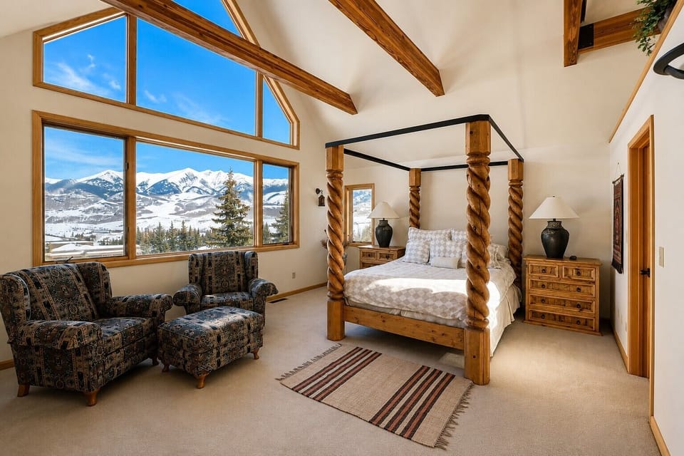 Master bedroom with mountain views, vaulted ceilings and abundant light