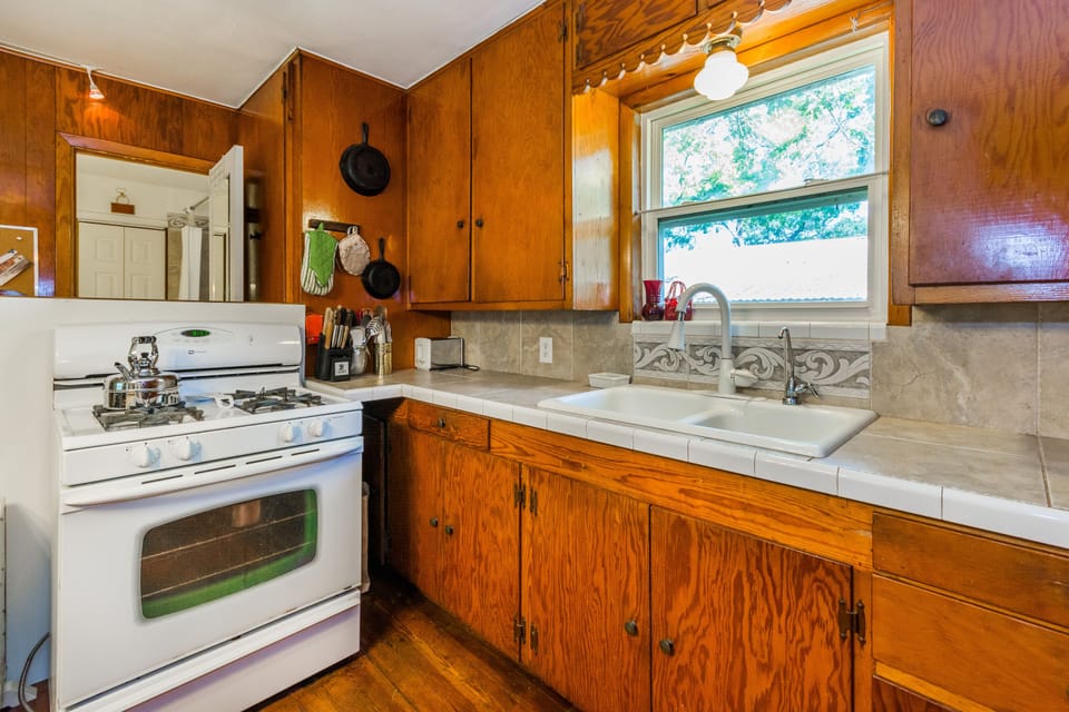 Fully equipped kitchen has a large stove,  R.O. water, microwave oven.