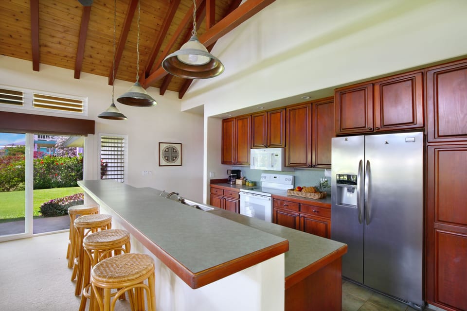 Guests naturally mingle at the spacious kitchen and bar before and after meals