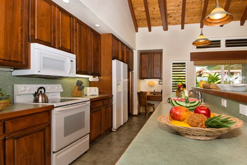The spacious kitchen and bar becomes the focal point of the entertaining.