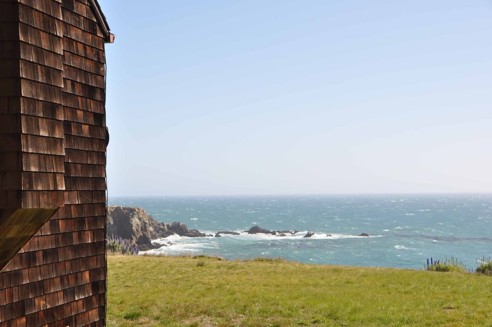 Ocean Hideaway's meadow and cove
