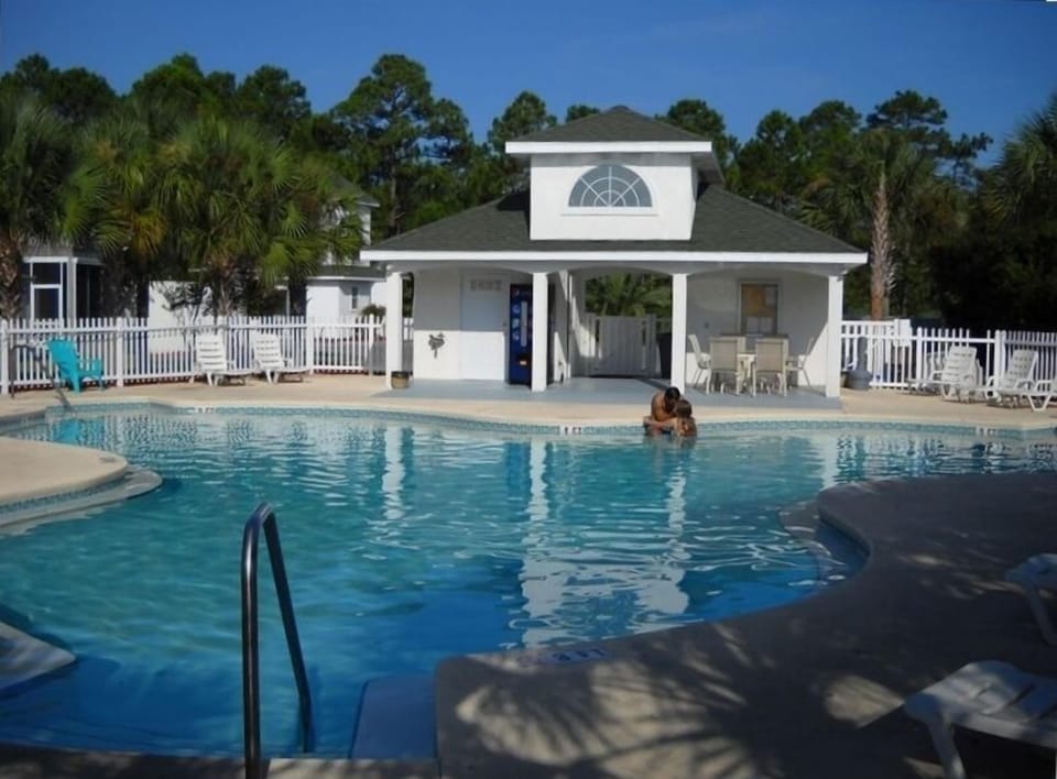 The Pool and bathrooms - Pop machine and outside shower 