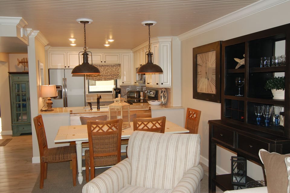 Our kitchen has quartzite counters, stainless appliances, & fridge w/ ice maker!