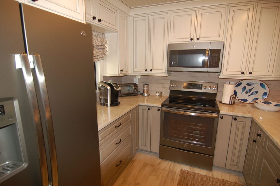 Our kitchen has everything you need including a Keurig coffee maker.